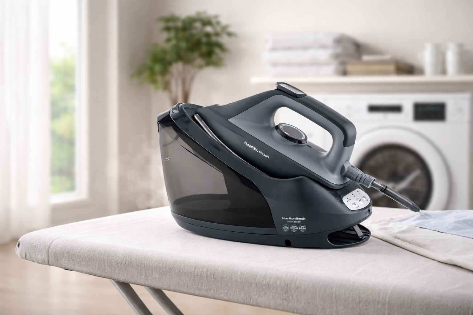 Black ironing machine on a table with a laundry room in the background